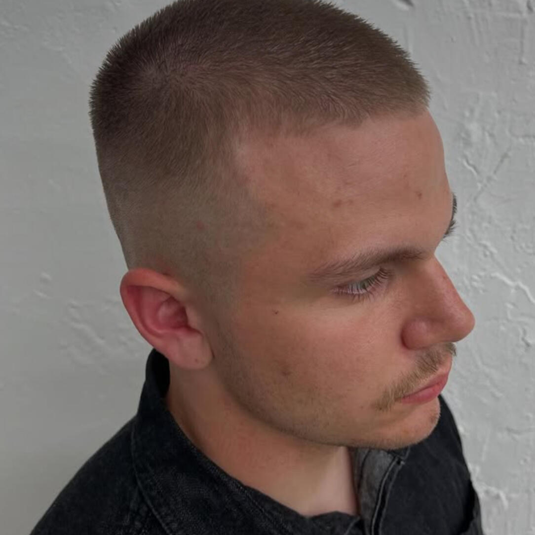 Close-up of a man with a buzz cut and skin fade from Cutters Men’s Hair barbershop in Hongdae, Seoul