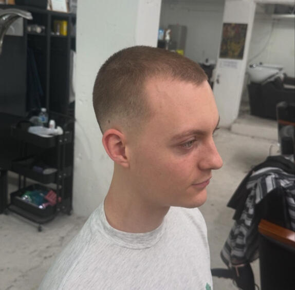 Man with a clean skin fade haircut at Cutters Men’s Hair barbershop in Hongdae, Seoul